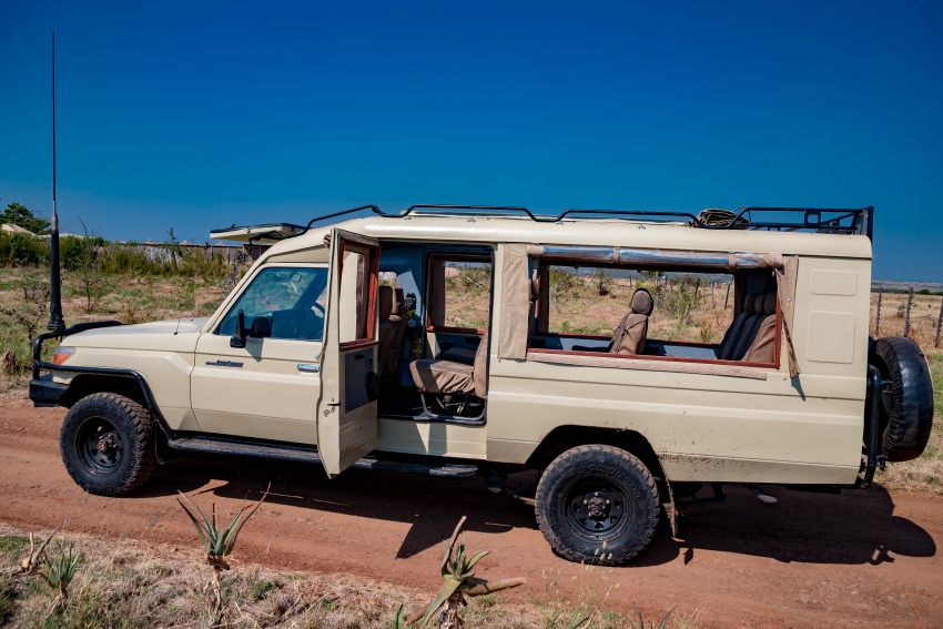 Z&K Tanzania Safaris privately managed custom 4x4 safari land cruiser tracking wildlife